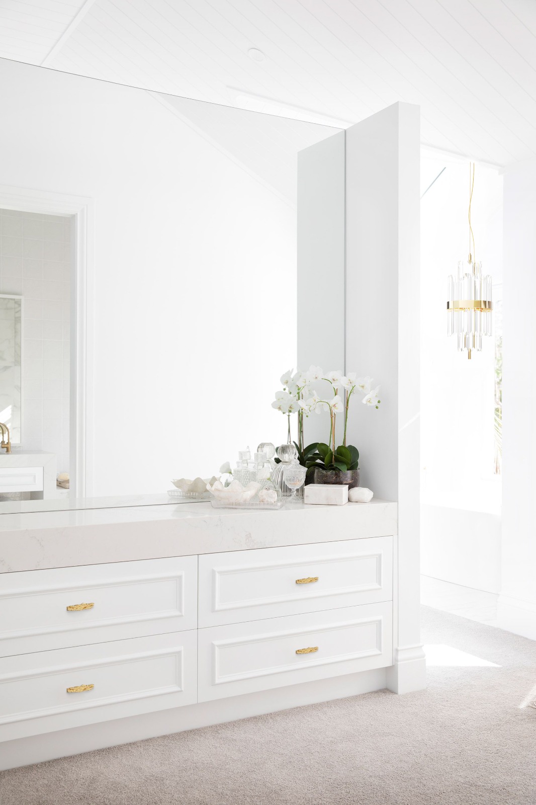 all white bathroom designs with gold detailed door handles